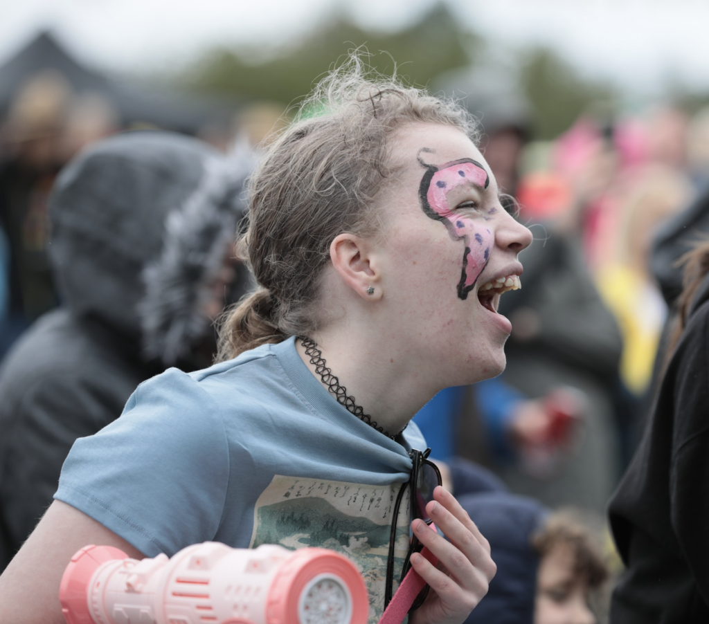 Photo of a young girl laughing at Ablefest